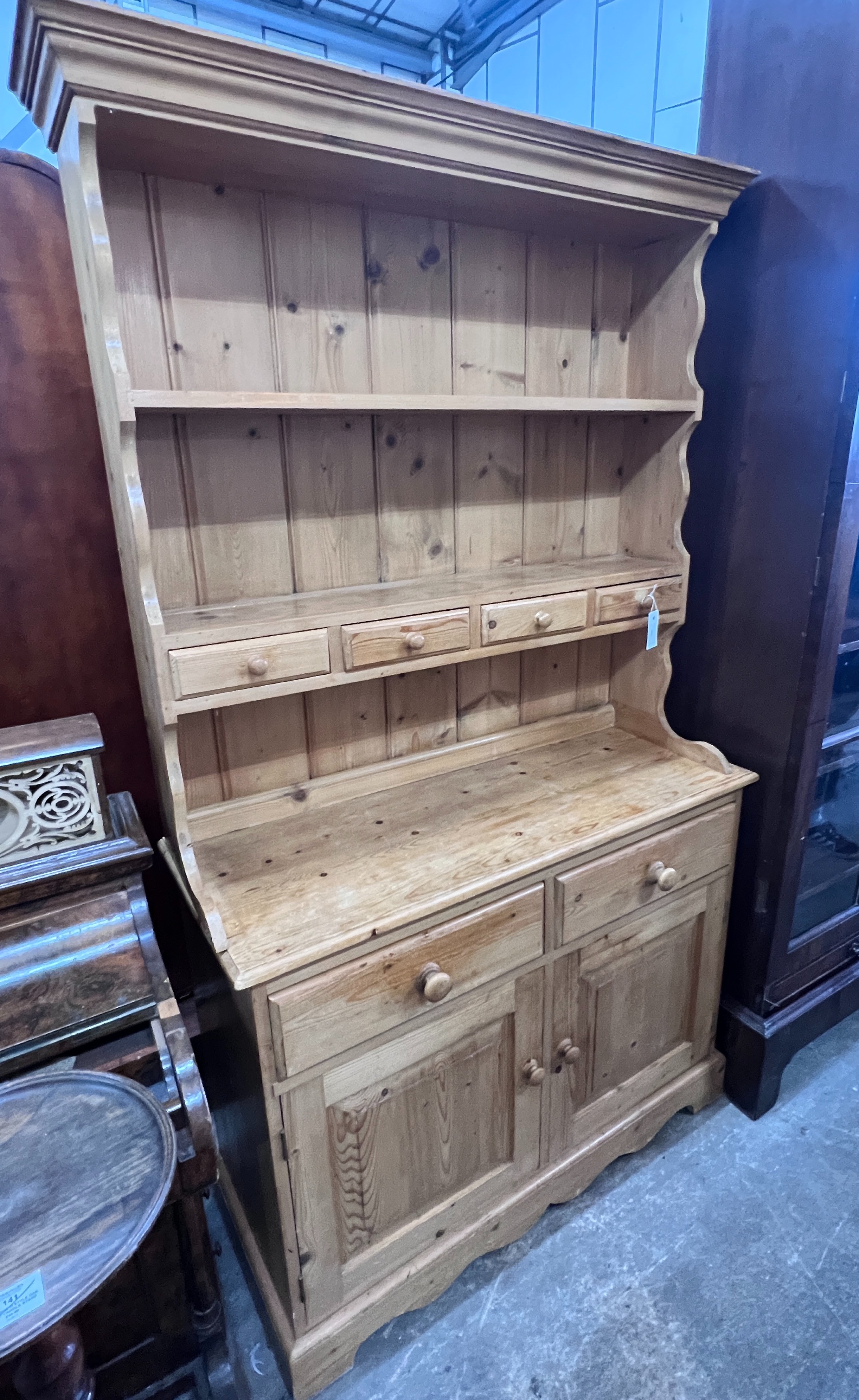 A Victorian style narrow pine dresser, width 104cm, depth 42cm, height 185cm